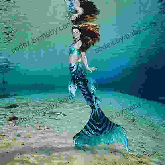 A Beautiful Mermaid With Long Flowing Hair And A Vibrant Tail Swims Gracefully Through The Ocean. How To Meet A Mermaid (Magical Creatures And Crafts)