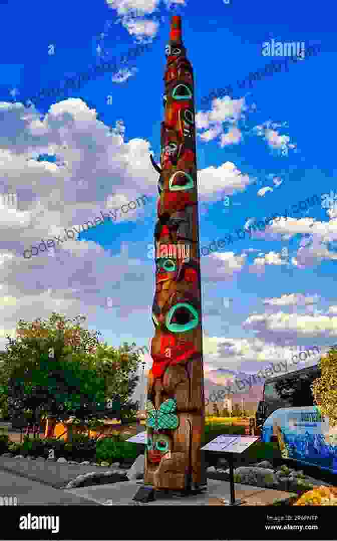 A Majestic Haida Totem Pole Stands Tall Against A Backdrop Of Towering Trees. 26 Feet To The Charlottes: Exploring The Land Of The Haida