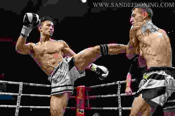 A Muay Thai Fighter Performing A Roundhouse Kick. Muay Thai Training Exercises: The Ultimate Guide To Fitness Strength And Fight Preparation