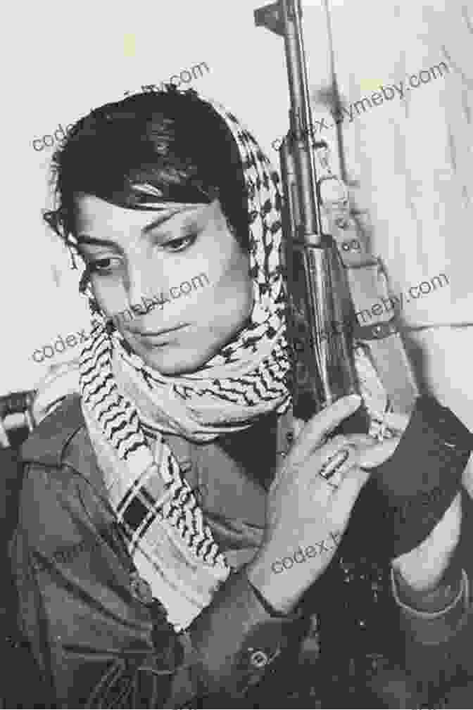 Leila Khaled, The Iconic Palestinian Revolutionary, Speaks At A Rally In Support Of The Palestinian Cause. Leila Khaled: Icon Of Palestinian Liberation (Revolutionary Lives)