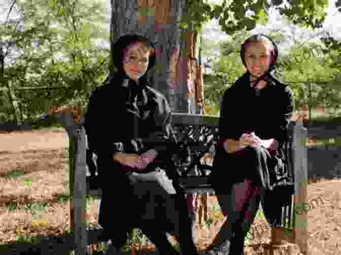 Two Amish Women Laughing And Embracing, Surrounded By A Serene Countryside Plain Wisdom: An Invitation Into An Amish Home And The Hearts Of Two Women